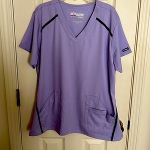 Grey Anatomy scrub top. Lilac color with navy stripe.